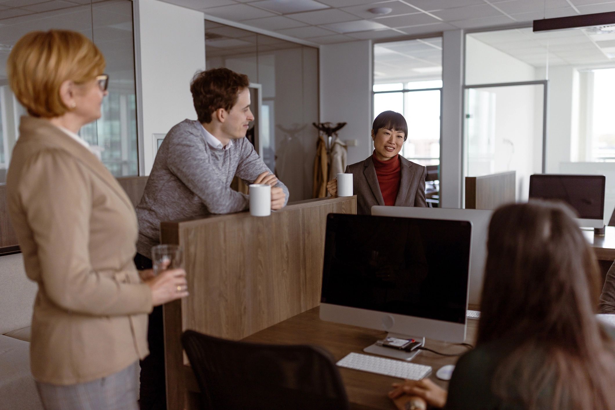 Editorial team collaborating in a newsroom